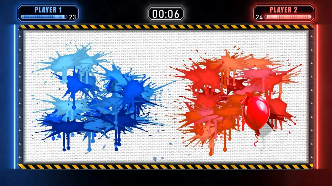 The PIN and POP wall at the end of a round, covered in blue and red paint splats